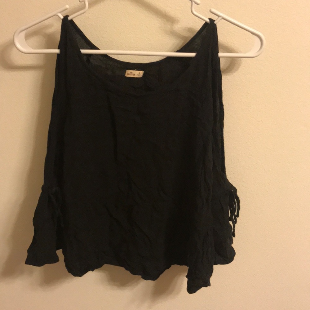 flowy black open arm blouse